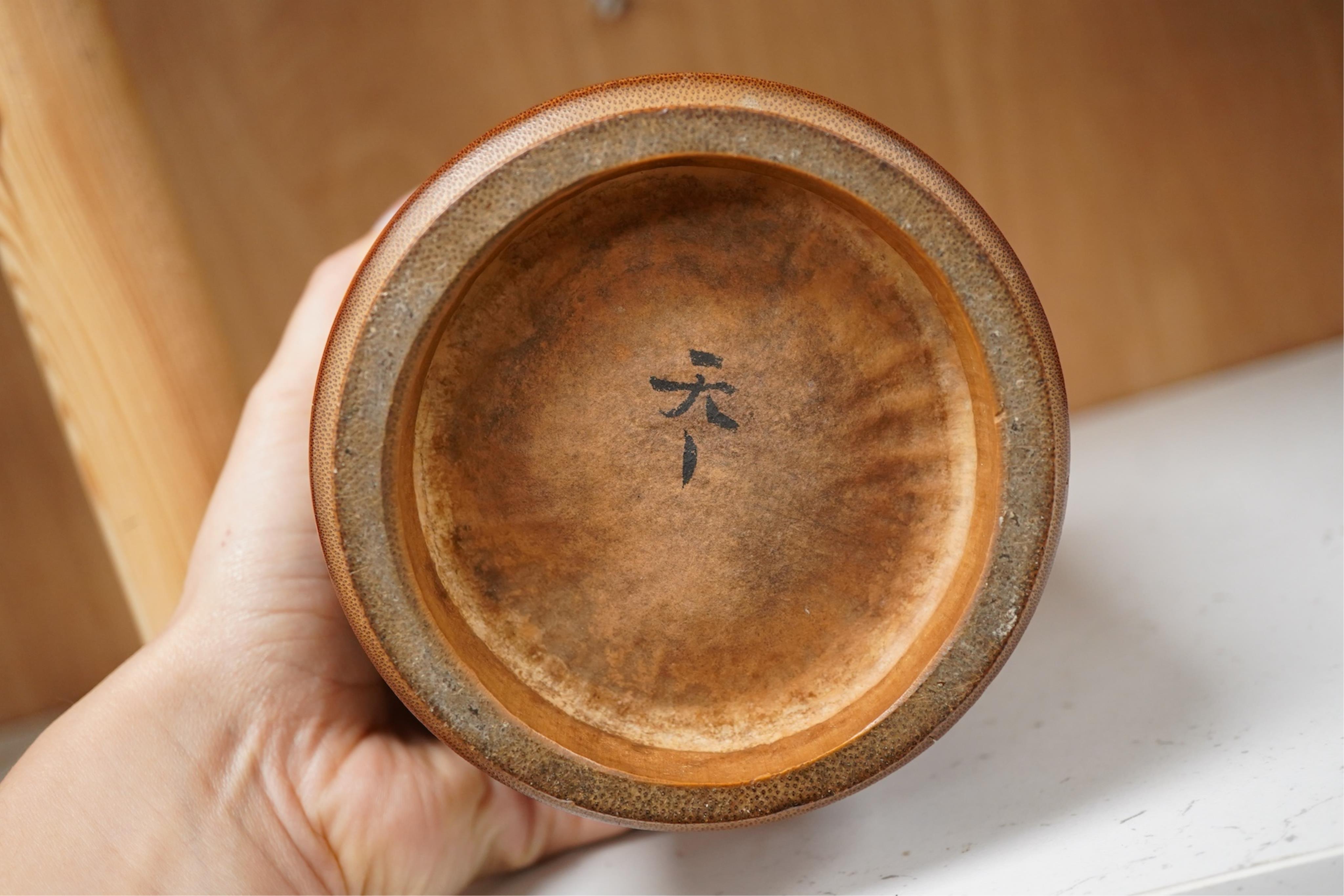 A Chinese carved bamboo tobacco jar and cover, 15cm high